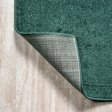Haze Solid Low-pile Area Rug Emerald